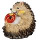 Igel mit einem Apfel, sitzend