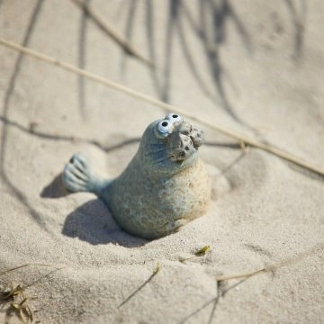 Seelöwe, sitzend, 6 x 5 cm