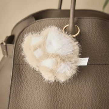Taschenanhänger Pfote, creme