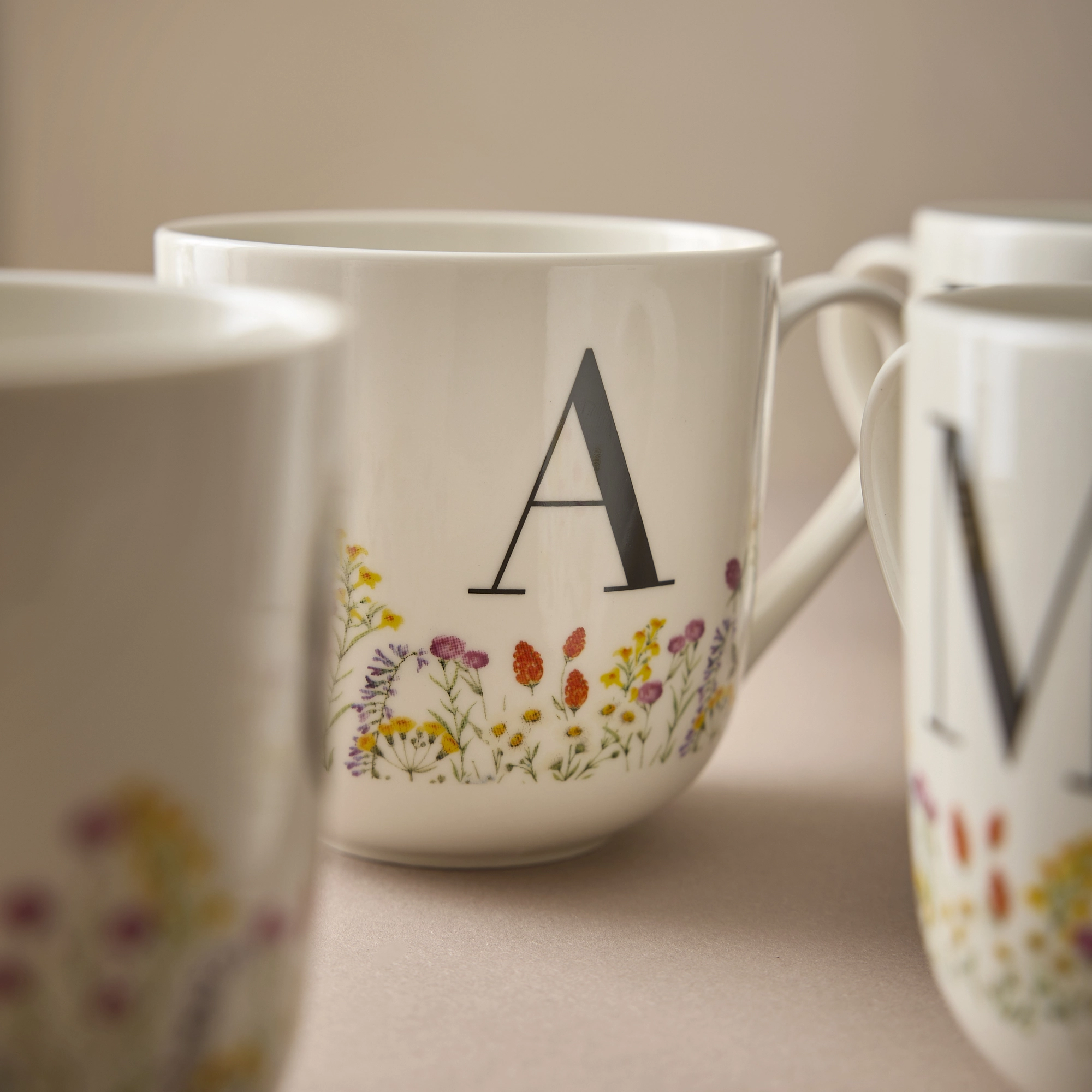Buchstaben-Becher