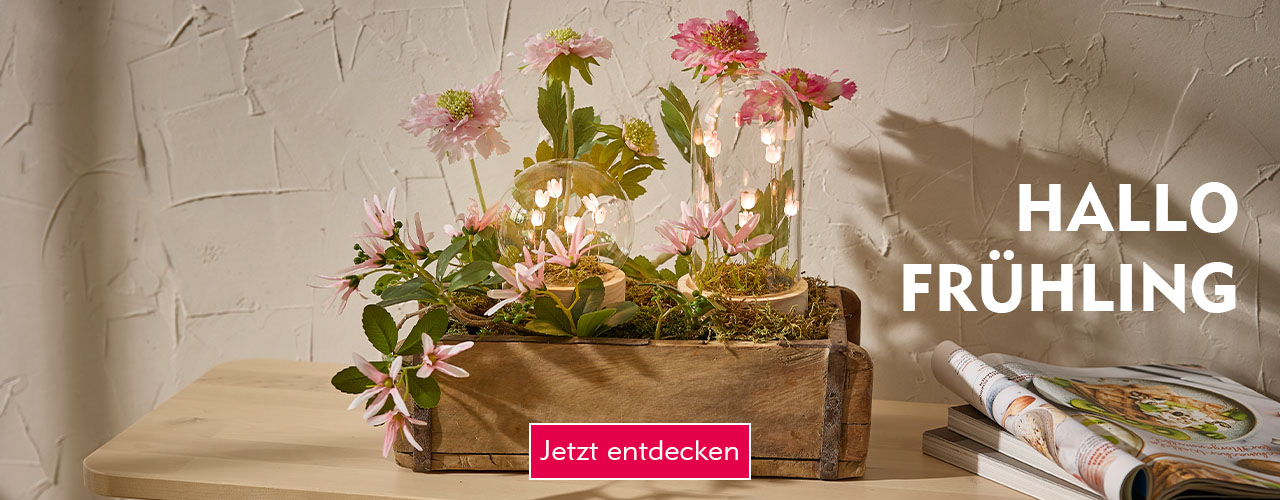 Entdecke Frühlingsdeko bei Nanu-Nana Frühlingsdeko mit Kunstblumen und LED-Objekt in Holzschale verlinkt auf die Kategorie Frühling