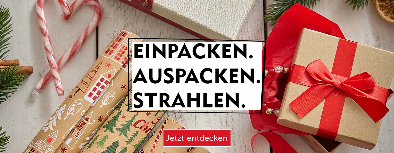 Weihnachtliches Geschenkpapier und Geschenkboxen verlinkt auf Geschenkverpackungen
