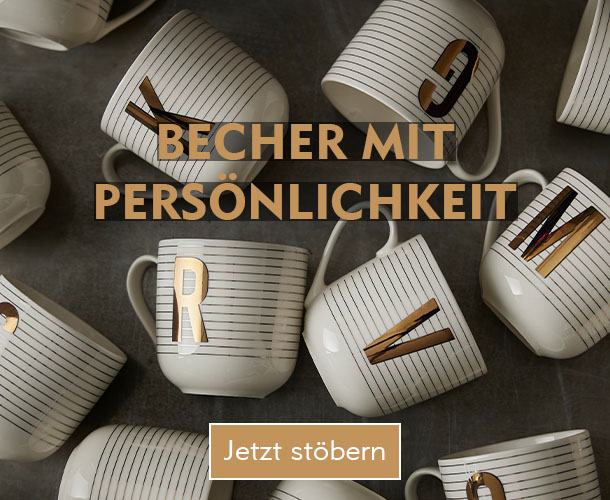 Weiße Porzellan-Becher mit goldenen Streifen und Buchstaben verlinkt auf Buchstabenbecher