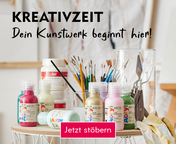 Acrylfarbe und Pinsel auf einem Tisch verlinkt auf die Kategorie Malereibedarf