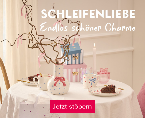 Ein gedeckter Tisch mit Schleifen-Produkten verlinkt auf die Kategorie Schleifen