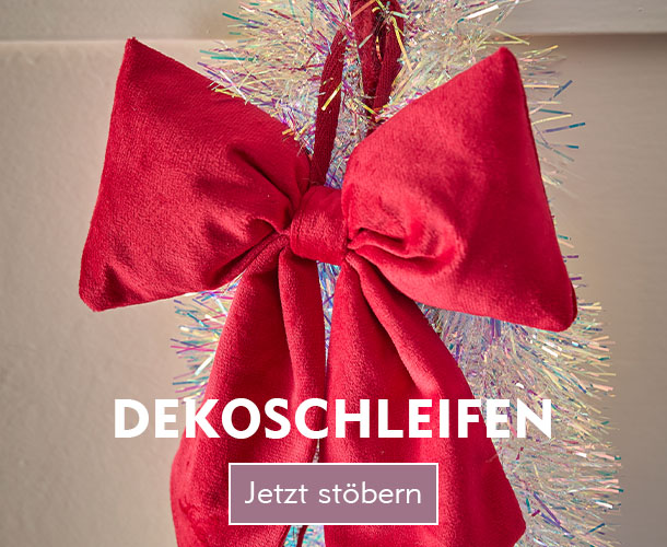 Shoppe Weihnachtsschleifen bei Nanu-Nana Eine rote Dekoschleife am Türrahmen verlinkt auf Weihnachtsschleifen