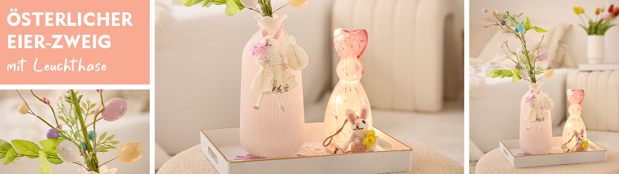 Rosafarbene Osterdeko mit einem LED-Hasen wird pr&auml;sentiert